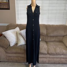 Nwot. Michael Kors Sleeveless Maxi Shirtdress Black It Is Unlined, With Button Front Closures, Vneck- Shirtdress Silhouette, Button Flap Pockets At The Chest, Slits At The Sides Approx 55 1/2” Long From Center Back Neck To Hem. If You Have Any Questions Please Let Me Know Thank You For Looking At My Closet Sleeveless Maxi Dress With Buttons, Fitted Sleeveless Maxi Dress With Buttons, Black Sleeveless Dress With Button Closure, Chic Sleeveless Maxi Dress With Button Closure, Sleeveless Maxi Dress For Work With Buttons, Sleeveless Maxi Dress With Buttons For Work, Casual Black Sleeveless Dress With Buttons, Sleeveless Buttoned Maxi Dress For Daywear, Sleeveless Maxi Dress With Buttons For Daywear