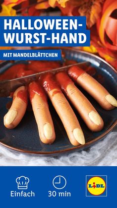 a plate with hot dogs on it and the words halloween - wurst - hand