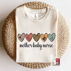 Mother Baby Nurse shirt, Postpartum Nurse shirt, Labor Delivery Nursing Gift, L&D Nurse, Mother Baby Nurse Tee, Baby Nurse Shirt, NICU nurse. * Bella Canvas 3001 (Unisex Tee) This classic unisex jersey short-sleeve tee fits like a well-loved favorite. Soft cotton and quality print make users fall in love with it over and over again. These t-shirts have ribbed knit collars to bolster shaping. The shoulders have to tape for a better fit over time. Dual side seams  hold the garment's shape for longer. - High-quality Soft & Light material. - Retail fit, Runs true to size. - Solid colors: Preshrunk 100% Ring-Spun soft cotton / Heather colors: Preshrunk 52% Ring-Spun cotton 48% polyester. * Women's T-Shirt (Bella Canvas 6400): What's comfier than a casual tee? A premium casual tee. Dress the par Mother Baby Nurse Shirts, Ob Nurse Shirt, Labor And Delivery Nurse Sweatshirt, Labor Delivery Nursing, Mother Baby Nurse, Nursing School Essential, Cotton Graphic Print T-shirt For Nursing, Nursing Baby, Nicu Nurse