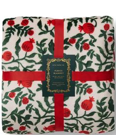 From Rifle Paper Co.&#x2C; this throw blanket features:Curl up this season with a fleece blanket featuring a classic seasonal print of illustrated pomegranates hanging from winding branches.Made of plush fleece&#x2C; the blanket comes packaged with a ribbon so it’s ready to gift.Approx. 50" W x 80" LMachine washImported. Holiday Blankets, Floral Blanket, Christmas Pillows, Religious Books, Gifts Cards, Comfy Fashion, Fleece Throw Blanket, Fleece Throw, Bag Tags