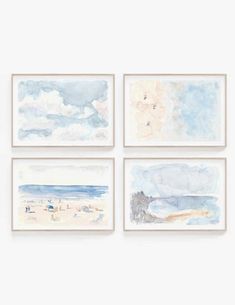 four watercolor paintings hanging on the wall