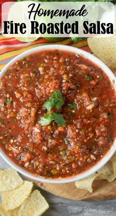 homemade fire roasted salsa in a bowl with tortilla chips