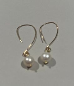 14kt gold filled metal hammered and formed to make these gorgeous earrings. Perfect for any occasion. Gorgeous Earrings, 14kt Gold, Fresh Water, Freshwater Pearls, Jewelry Earrings Dangle, Gold Filled, Dangle Drop Earrings, Washington, Dangle Earrings