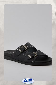 Vegan suede upper/Slip-on style/Dual buckle closure/Rubber outsole Casual Slip-on Footbed Sandals With Buckle, Suede Slip-on Sandals With Buckle Closure, Black Slip-on Sandals With Studded Rubber Outsoles, Black Buckle Closure Slip-on Sandals, Black Adjustable T-strap Sandals With Buckle Closure, Women's Jeans, American Eagle Outfitters, American Eagle, Women Jeans