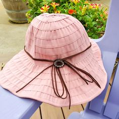 This is the best hat! So light and lovely. Perfect to stuff in your bag for a day in the sun. Just pull it out of your bag, adjust for your perfect fit, then enjoy your perfect day in the sun. 1 Season At A Time wants you to live in your season so that means setting you up for success! We want you to be able to enjoy the sun and protect you at the same time. These hats are 50+ UV sun protection. Cover your face, neck, ears and shoulders as you play in the sun. Whether you are gardening, riding i Adjustable Pink Sun Hat For Travel, Pink Short Brim Hat For Travel, Pink Bucket Sun Hat For Outdoor, Pink Travel Hat With Short Brim, Pink Summer Sun Hat For Travel, Pink Summer Bucket Hat For Outdoor, Pink Wide Brim Hat For Travel, Adjustable Pink Bucket Hat For Vacation, Pink Summer Hat For Outdoor