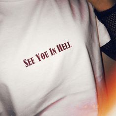 "See You In Hell. High-quality classic cut T-shirt designed by us and made in Poland. JOIN US ON INSTAGRAM 🌹 http://instagram.com/blvck.pl 🏷 PRODUCT DETAILS 🏷 Hand-printed Crew neck 100% High-quality Cotton Made in Poland 📏 SIZING & FIT 📏 All our sweatshirts and T-shirts are unisex. Measurements (width/length) XS - 49/64 cm (19\"/25\") S - 51/68 cm (20\"/27\") M - 53/70 cm (21\"/27.5\") L - 55/72 cm (21.5\"/28\") XL - 57/74 cm (22.5\"/29\") 📦 SHIPPING AND DELIVERY 📦 We aim to process Cut Tshirt Designs, Clothing Grunge, Grunge Clothing, T Shirt Aesthetic, Grunge Shirt, Hoodie Aesthetic, Casual Nails, Aesthetic Shirt, Shirt Aesthetic