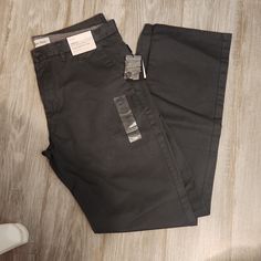 New With Tags Claim Klein Body Fit Pants Dark Gray 33x34 Calvin Klein Wide Leg Pants With Pockets, Calvin Klein Casual Full Length Bottoms, Calvin Klein Casual Straight Leg Pants, Casual Calvin Klein Straight Leg Pants, Casual Straight Leg Calvin Klein Pants, Calvin Klein Classic Straight Leg Bottoms, Calvin Klein Cotton Straight Leg Pants, Classic Straight Leg Calvin Klein Bottoms, Calvin Klein Tapered Leg Bottoms With Pockets