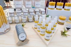 several bottles of skin care products on a table