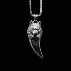 Embrace Your Wild Side: Silver Wolf Head Necklace  Unleash your inner strength and courage with our Silver Wolf Head Necklace! Crafted with exquisite detail, this charming pendant captures the spirit of the noble wolf, revered for its loyalty and resilience. Whether you're a fan of Viking lore or simply drawn to the mystique of the wild, this piece of animal jewelry is sure to make a statement. Wear it as a symbol of your untamed spirit or gift it to a fellow wolf enthusiast. Shop now and let yo Silver Wolf Design Stainless Steel Jewelry, Silver Stainless Steel Wolf Jewelry, Silver Stainless Steel Wolf Design Jewelry, Silver Wolf Design Pendant Necklace, Sterling Silver Wolf Design Necklace As Gift, Sterling Silver Necklace With Wolf Design As Gift, Sterling Silver Necklace With Wolf Design For Gift, Viking Wolf, Wolf Pendant