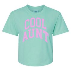 Perfect addition to any trendy aunt's wardrobe and show off your status as a proud and stylish aunt with The 'Varsity Cool Aunt' Boxy T-Shirt! 6.1 oz./yd², 100% ringspun cotton, 20 singles Garment-dyed soft ring spun fabric Boxy fit, slightly cropped Topstitched, classic width, collar Taped neck and shoulders Twill label Trendy Pre-shrunk Cotton Cropped T-shirt, Retro Letter Print Cropped T-shirt For Spring, Retro Cropped T-shirt With Letter Print For Spring, Cool Spring T-shirt With Text Print, Trendy Cropped Cotton T-shirt With Funny Text, Trendy Cotton Cropped T-shirt With Funny Text, Casual Pink Cropped T-shirt With Text Print, Casual Cropped Crew Neck T-shirt With Funny Text, Green Cropped Cotton T-shirt With Letter Print