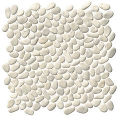 white pebbles are arranged in the shape of a square