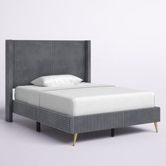 the bed is made up and ready for someone to use it in their home or office