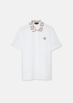 Made from cotton piqué, this short-sleeved polo shirt features a three-button placket, a lurex Greca embroidery at the collar and Medusa logo a the chest. Luxury Polo Shirt With Ribbed Collar And Short Sleeves, Luxury Polo Shirt With Ribbed Collar, Luxury Short Sleeve Polo Shirt With Ribbed Collar, Designer Short Sleeve Polo Shirt With Embroidered Logo, Designer Short Sleeve Tops With Ribbed Collar, Designer Short Sleeve Top With Ribbed Collar, Designer Cotton Polo Shirt With Short Sleeves, Classic Polo T-shirt With Striped Collar, Luxury Short Sleeve Polo Shirt With Striped Collar