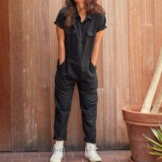 Our All-Time Best-Selling Jumpsuit. Stylish, Functional, And Totally Badass! It's Truly A Form-Meets-Function Piece You'll Rock For Years To Come. Made With A Soft Organic Cotton And Linen Blend, Garment-Dyed For A Lived-In Feel. Classic Button Entry And Loads Of Pockets, So You Can Leave Your Purse At Home. Feminine Detailing Includes A Rounded Collar, Adjustable Waistline, And Tapered Leg That Looks Great Rolled Up Too! 51% Organic Cotton And 49% Linen. Organic Cotton Cuts Out All The Harmful Black Overall Jumpsuits And Rompers With Pockets, Black Jumpsuits And Rompers With Pockets For Work, Black Summer Overalls For Workwear, Black Jumpsuit With Pockets For Workwear, Black Summer Workwear Overalls, Black Relaxed Fit Jumpsuit For Workwear, Black Relaxed Fit Overalls With Pockets, Black Relaxed Fit Overalls For Work, Fitted Black Cotton Jumpsuits And Rompers