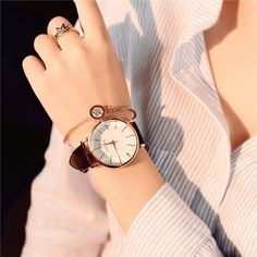 This women's quartz watch is designed with a water-resistant rating of 3 bar, perfect for everyday use. The reliable Japanese quartz movement offers precise timekeeping and a classic look. A timeless addition to any wardrobe. Designed by 4COLORDRESS Swiss Army Watches, Luxury Women Fashion, Women Watches, Bracelet Cuir, Stylish Watches, Casual Watches, Watches Women Fashion, Women Wrist Watch, Luxury Women