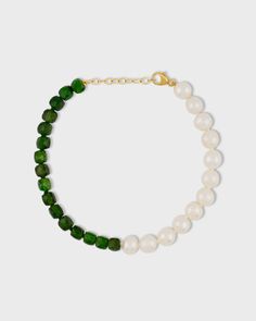 Deep green chrome diopside and lustrous white round pearls strung together as a bracelet. We call this our union bracelet as it marries two stones from completely different environments creating a beautiful match. 14 Karat Yellow Gold Round Pearl, 8 carats 6 to 7 inches length 4mm bead size Style # JJ-BOC-509 Green Chrome, Rainbow Sapphires, Citrine Crystal, Aquamarine Blue, Amethyst Crystal, Deep Green, Smoky Quartz, Turquoise Jewelry, Pearl Bracelet