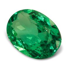 an oval shaped green emerald stone