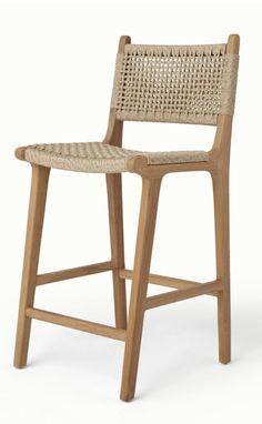 a wooden stool with wicker seat and backrests on an isolated white background