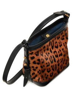 A classic small shoulder bag in leopard-print hair with smooth vegetable-tanned leather trim Leopard print long-hair goat leather with smooth vegetable-tanned leather trim Bonded microsuede lining Brushed gold-tone hardware Adjustable shoulder strap can be worn crossbody (50-57cm drop) Snap button closure Can fit a small wallet, large phone and other essentials Made-in-Italy 17 cm length x 10 cm depth x 18 cm height Leather Shoulder Bag With Leopard Print And Leather Handles, Leopard Print Leather Shoulder Bag With Leather Handles, Luxury Rectangular Calf Hair Bag, Luxury Calf Hair Shoulder Bag For Daily Use, Leather Satchel Shoulder Bag In Leopard Print, Leopard Print Leather Satchel Shoulder Bag, Designer Leopard Print Bag For Everyday Use, Luxury Leopard Print Shoulder Bag With Gold-tone Hardware, Luxury Shoulder Bag With Leather Handles And Calf Hair