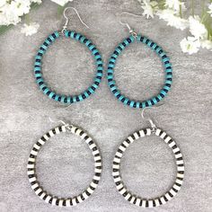 "✦Gemstone: Magnesite Turquoise/ Howlite Turquoise, Seed bead ✦Material: Sterling Silver ✦Color: Blue/White/Black ✦Shape: Heishi, Disc ✦Turquoise Bead Size: 4x2mm ✦Seed Bead Size: 2x1mm ✦QTY: 1 pair earrings / package Crafted with true stones, these earrings are individually unique. These wire wrapped dangle earrings make the perfect gift for a simple yet distinct jewelry lover. Fun and festive turquoise hoops measuring 6\" round with a total length of 6.5\" with the ear wire. Made with gorgeous Turquoise Earrings With Large Beads For Gifts, Beach Jewelry With Large Round Beads, Round Beach Jewelry With Large Beads, Adjustable Turquoise Earrings With Large Beads, Turquoise Beaded Earrings For Beach, Turquoise Round Beaded Earrings With Ear Wire, Turquoise Beaded Earrings With Natural Stones, Turquoise Beaded Earrings With Round Beads, Adjustable Turquoise Beaded Earrings With Large Beads