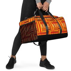 This African print travel duffle gym bag is the perfect way to add a touch of African culture to your fitness routine! The vibrant colors and African design of this bag will have you making a statement wherever you go. This bag features a large main compartment and plenty of pockets, including one with a zipper to keep all your gym gear organized. It's made with durable fabric and a reinforced base, so it can handle any adventure you take it on. With its adjustable padded shoulder straps and comfortable handles, it's easy to carry and perfect for traveling. Get ready to make a statement with this stylish and functional African print travel duffle gym bag! This duffle bag is the perfect companion for every occasion--take it with you when traveling, running daily errands, or going to the gym Functional Orange Sports Bag, Rectangular Weekender Bag With Luggage Sleeve For Gym, Sports Rectangular Gym Bag With Luggage Sleeve, Rectangular Travel Bag With Luggage Sleeve For Gym, Functional Multicolor Rectangular Travel Bag, Multicolor Functional Duffle Bag For Overnight Trips, Gym Gear, Travel Duffle, Duffel Bags