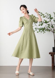 Cool and comfortable for hot summer days, this natural linen dress is elegant and stylish.    It is a wonderful wardrobe staple that's a timeless classic you'll wear again and again.Pure natural linen materials, comfortable, breathable, refreshing and soft fabric. All our items are Tailored and Handmade and Made to Order ,I can make Any Size . I design new styles every week, please collect my store. I believe that you will meet your favorite styles. ★★FEATURES Linen 55% + Cotton 45% ( Medium Wei Beige V-neck Linen Dress For Beach, Elegant Summer A-line Linen Dress, Summer Linen V-neck Sundress, Beige A-line Linen Dress For Spring, Spring Beige A-line Linen Dress, Fitted V-neck Linen Sundress, Spring Linen A-line Midi Dress, Linen V-neck Sundress Maxi Dress, Summer Linen A-line Maxi Dress