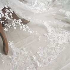 Heavy embroidered lace fabric with an amazing design and high quality about that product Dimensions Length: 1 Yards; Width: 51.5 Inches Primary fabric: Tulle Primary fiber: Rayon Secondary fiber: Nylon Color: photo color ❀❀ About the sample❀❀ If you need to check the quality and pattern of the lace fabric, we can provide you with a small sample; when you confirm the order, we will refund the sample fee for you. Perfect for dress making, bridal wear, wedding gown, bodice or curtains ❀❀ MEASUREMEN Off White Wedding Dresses, Fabric Wedding Dress, Tulle Embroidery, White Lace Fabric, Beaded Lace Fabric, Bridal Lace Fabric, Bridal Dresses Lace, Wedding Dress With Veil, Wedding Dresses With Flowers