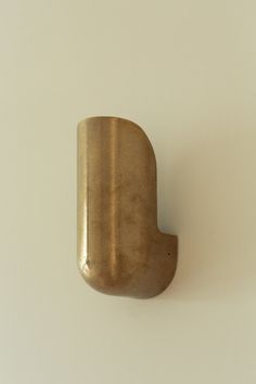 a metal object mounted on the wall