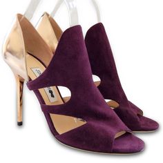 New $976 Jimmy Choo Tarine Suede Cutout Bootie Heels - Gold, Purple - Size 38 Condition: Brand New With The Dust Bag. The Original Retail Price Is $895+Tax. There Are Some Scratches, Please See Photos For Details. Size: 38 Measurements: Insole: 9 1/2" Width: 3" Heel Height: 4" Material: Leather And Suede Origin: Italy Purple Pointed Toe Heels For Gala, Elegant Purple Open Heel Shoes, Chic Purple Heels For Gala, Luxury Purple Open Heel Heels, Luxury Purple Heels With Heel Strap, Elegant Purple Open Toe Heels, Purple Suede High Heels, Luxury Purple Heels With 4-inch Heel, Purple Suede High Heel Heels