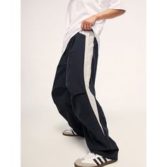 Loose Retro Color-Block Sports Wide-Leg Pants Material: 100%Polyester Size: S, M, L, XL Color: Navy Blue, Purple Applicable Scene: Leisure, Daily, Vacation White Wide-leg Gym Bottoms, White Wide Leg Gym Bottoms, Baggy Wide-leg Sports Pants, Stretch Wide Leg Color Block Bottoms, Baggy Wide-leg Jogging Pants, Stretch Wide Leg Bottoms With Color Block, Baggy Wide-leg Pants For Jogging, Baggy Wide Leg Bottoms For Jogging, Sporty Pants With Side Stripes For Workout