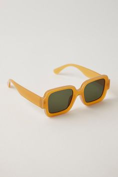 Classic sunglasses with a twist. These playful sunnies are featured in a square-shaped silhouette with a fun outlined frame and gradient-tined lenses. **Features:** Square-shaped design, thick frame with contrast-colored outline, thick temples, gradient-tinted lenses, fixed nose pads **Why We | Shadow Side Square Sunglasses by Free People in Yellow Rectangular Orange Sunglasses With Gradient Lenses, Orange Rectangular Sunglasses With Gradient Lenses, Yellow Rectangular Sunglasses With Gradient Lenses, Retro Square Frame Sunglasses For Beach, Yellow Square Frame Sunglasses For Beach, Retro Sunglasses With Uv Protection And Square Frame, Retro Yellow Sunglasses For Vacation, Trendy Rectangular Yellow Sunglasses, Trendy Orange Square Frame Sunglasses