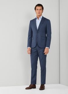 With its blue checked design, this suit is made from 100% Italian wool. Offering the perfect combination of style and comfort, its traditional notch lapel, single-breasted closure and flap pockets make it a must-have for formal events.     - Welt pocket on the chest   - Two-button closure   - Trousers with back welt pockets Trendy Suits, Business Suits, Checked Suit, Hackett London, Short Models, Linen Suit, Modern Gentleman, Business Suit, Wool Suit