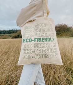 "This cute & trendy tote bag is made from 100% recycled materials. This recycled cotton canvas tote bag is made to carry a heavy load and to last years of usage with its reinforced stress points. The durable canvas material makes the bag usable over and over again. Most ideal for school, a trip to the local farmers market, a park visit, a beach trip or even just for cute instagram pics :) Tote description: - 12 oz recycled canvas - Standard size - Reinforced at stress points - 21\" handles - Fla Eco-friendly Recyclable Canvas Bag For Daily Use, Recyclable Canvas Tote Bag For Everyday Use, Eco-friendly Everyday Canvas Gift Bag, Casual Bags Made From Recycled Materials, Casual Bags Made Of Recycled Materials, Recyclable Canvas Shopping Bag, Green Cotton Canvas Bag For Everyday Use, Trendy Everyday Recyclable Bags, Green Cotton Canvas Bag For Everyday