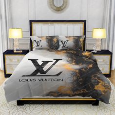 the louis vuitton bedding set is made up with black and gold paint