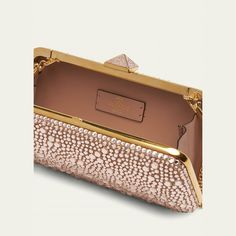 Valentino Garavani "Carry Secrets" clutch bag in allover rhinestones  Detachable chain shoulder strap Can be worn as a clutch or shoulder bag  Structured top with Roman Stud lift-clasp closure  Approx. 3.9"H x 8.3"W x 1.6"D Made in Italy Luxury Rectangular Clutch For Cocktail, Rectangular Chain Strap Bag For Cocktail, Luxury Bags With Chain Strap For Gala, Luxury Embellished Clutch Evening Bag, Luxury Evening Bags With Rhinestones, Luxury Embellished Evening Clutch Bag, Rectangular Cocktail Bag With Chain Strap, Luxury Embellished Evening Bag For Events, Luxury Clutch With Gold-tone Hardware For Events