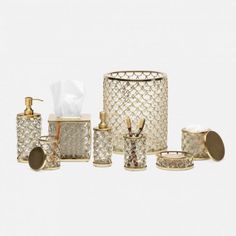 gold bathroom accessories set with soap dispenser, toothbrush holder and tissue dispenser