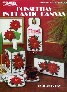 the cover of a cross stitch book with poinsettias in plastic canvass