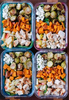 four plastic containers filled with different types of food