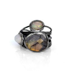 GemFormingStudio D E T A I L S Labradorite Ring | Fire Opal Ring | Wire Wrapped Ring | Gemstone Ring | Ring For Her, Ring For Women, Statement Ring, Stackable Ring, Unique Ring Size : All sizes Available Weight : 5.62 gm Stone Size : 16 x 13 mm Material : Brass Polish : Gold Polish . Contact us for wholesale prices. R I N G S https://www.etsy.com/in-en/shop/GemFormingStudio?section_id=22783374 B E A D S https://www.etsy.com/in-en/shop/GemFormingStudio?section_id=22828835 W A N D S https://www.et Fusion Rings With Natural Stones For Anniversary, Fusion Rings With Oval Natural Stones, Fusion Style Natural Stone Rings For Anniversary, Fusion Oval Rings With Natural Stones, Fusion Style Oval Rings With Natural Stones, Fusion Style Natural Stones Ring For Anniversary, Fusion Style Oval Ring With Natural Stones, Fusion Style Stackable Round Rings, Fusion Style Anniversary Rings With Natural Stones