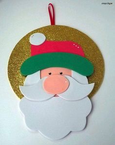 a christmas ornament with a santa clause on it's face and beard