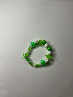 Nice, vibrant green bracelet made out of good beads. Cheap Green Bracelets With Tiny Beads, Cheap Green Novelty Bracelets, Green Beaded Bracelets, Green Bracelet, Vibrant Green, Bracelet Making, Beaded Bracelet, United Kingdom, Jewelry Bracelets