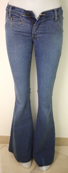 "18th Amendment 'Harlow' ladies vintage blue denim flared jeans-Waist 24\"-circa 1990s-Weight 584g-FREE postage The jeans are made of 98.4% Cotton and 1.6% Elastane The jeans are used but in excellent condition with the following approximate measurements: Overall length (edge to edge): 109cm (from behind); Waist (flat front): 36cm; Hips (flat front): 40cm; Length (inside leg): 86cm; Flare width (edge to edge): 32cm FREE POSTAGE WORLDWIDE" Retro Denim Blue Flares For Spring, Fitted Denim Flare Jeans, Retro Stretch Denim Blue Flare Jeans, Fitted Blue Flare Jeans, Fitted Medium Wash Flared Hem Jeans, Blue Fitted Flare Jeans, Retro High Rise Denim Blue Flares, Casual Straight Leg Blue Flares, Casual Blue Flares For Fall