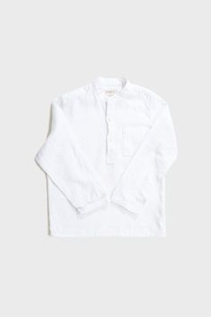 The linen shirt is comfortable because it has long sleeves, snaps to close, and a pocket on the front. This linen shirt for boys is soft, cute, and simple. It should be in every boy's closet. This shirt is good for everyday wear. It's also a great choice for a birthday, a christening, a baptism, a gift, or a ring bearer outfit. Match it with shorts or trousers for a cool, casual summer look. * 100% linen woven of finest European flax (NL/BE /FR) * OEKO-TEX® certified for chemical safety * Pre-wa White Linen Shirt With Pockets, White Linen Button-up Shirt, White Linen Shirt With Buttons, Linen White Shirt, Chemical Safety, Boys Closet, Bearer Outfit, Boys Long Sleeve Shirts, Shirt Linen