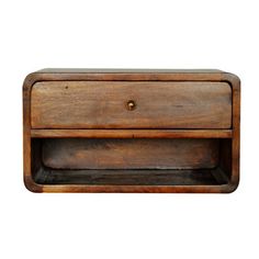 an old wooden drawer with two drawers on the bottom and one drawer open to reveal something