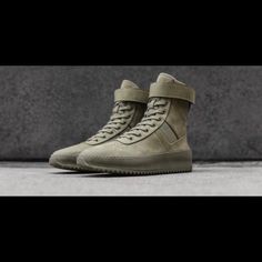 Fear Of God Military Sneakers New With Box Designer High-top Sneakers With Vulcanized Sole, Modern Lace-up Boots For Streetwear, Modern Custom Sneakers With Vulcanized Sole, Mid-top Leather Boots With Vulcanized Sole, Leather Mid-top Boots With Vulcanized Sole, Modern Suede High-top Sneakers, Modern Low-top Boots With Contrast Sole, Modern Leather High-top Sneakers With Boost Midsole, Designer Boots With Rubber Sole For Streetwear