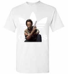 Rick Grimes is alive and well in the "Walking Dead." Show your love for AMC's hit show with this Rick Grimes short sleeve t-shirt. This tee will be a must have wardrobe staple that goes great with any outfit! Buy now. Walking Dead Rick Grimes, The Walking Dead Rick, Walking Dead Rick, Nike Air Jordan Shoes, Rick Grimes, Air Jordan Shoes