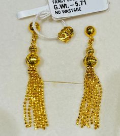 Dangling tassel earrings 916 Gold Gold purity: 916 gold / solid 22k gold Hallmark: 916 stamped Weight : 5.70 grams Colour: yellow gold Design : solid beautiful tassels dangling earrings with push back posts BN Authentic 916 gold  FAQs Q: Is it real gold? A: yes it's real authentic genuine 916 gold Q: can pawn? A: yes it's pawnable ⭐️GoForGold⭐️ Yellow Gold Earrings For Anniversary And Festivals, Yellow Gold Earrings For Anniversary And Festive Occasions, Festive Yellow Gold Anniversary Earrings, Yellow Gold-plated Earrings With Latkans, Yellow Gold Plated Earrings With Latkans, Yellow Gold Jewelry With Latkans For Anniversary, Gold Plated Earrings With Latkans For Anniversary, Gold Plated Latkans Earrings For Anniversary, Yellow Gold Dangle Bridal Earrings With Latkans