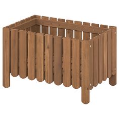 a wooden planter filled with lots of wood slats on top of each other