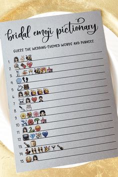 a printable bridal enigi dictionary on a white plate with gold foil