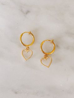 Get the look of pierced ears! Gold filled clip-on hoops feature a spring loaded clip that securely hugs your ear. Hoops are gold filled, charms are gold plated. Different charms to choose from! Hoops measure 12mm in diameter. These earrings are for non-pierced ears. For more clip on styles check the listing below: https://www.etsy.com/listing/839774996/clip-on-butterfly-earrings-butterfly?ref=shop_home_active_1 *if there is a different earring you see on our page that you would like as a clip on Small Hoop Clip-on Earrings For Gift, Small Hoop Clip-on Huggie Earrings As Gift, Trendy Clip-on Dangle Hoop Earrings, Clip-on Huggie Earrings For Gift, Clip-on Huggie Earrings As Gift, Everyday Dangle Clip-on Earrings, Everyday Clip-on Dangle Earrings, Clip-on Small Hoop Huggie Earrings For Gift, Small Hoop Clip-on Huggie Earrings For Gifts